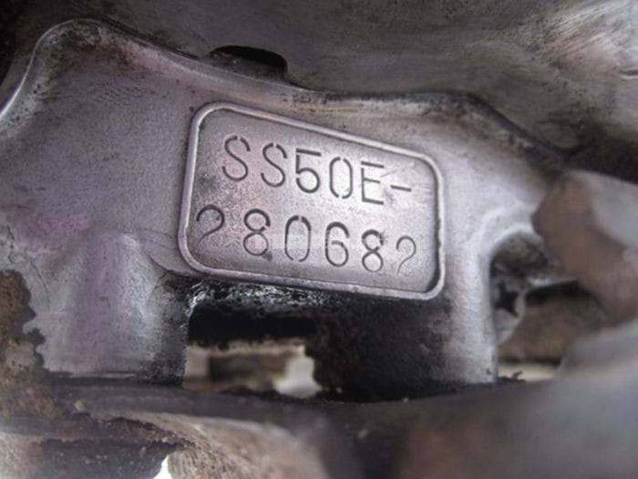 Biểu đồ giải thích ý nghĩa các ký tự trong chuỗi số máy xe máy, bao gồm quốc gia sản xuất và đời xe.
