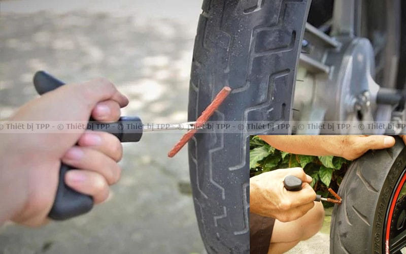 Thợ thực hiện phương pháp vá dùi cho lốp xe máy không ruột