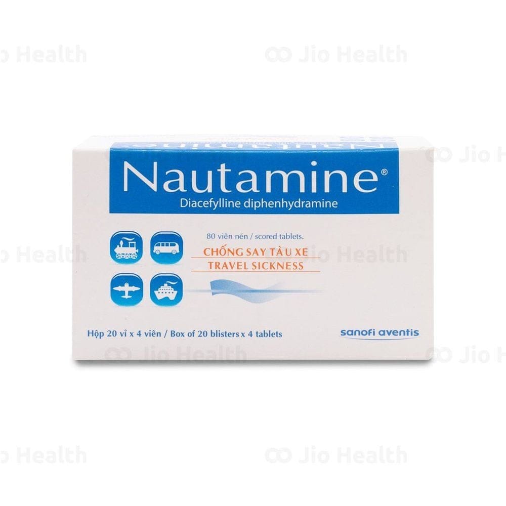 Thuốc Nautamine đặt cạnh đồng hồ, minh họa thời gian tác dụng thuốc say xe Nautamine và các yếu tố ảnh hưởng đến hiệu quả.